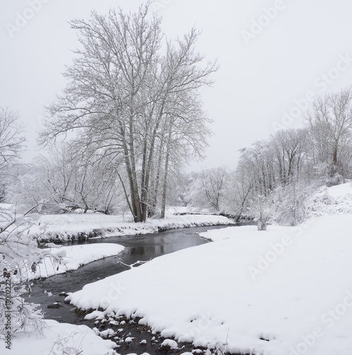 Hudson Valley Creek in a Snowy Winter Landscape