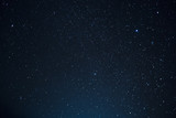 Night scape with beautiful stary sky at the high mountain. Star texture. Space background.