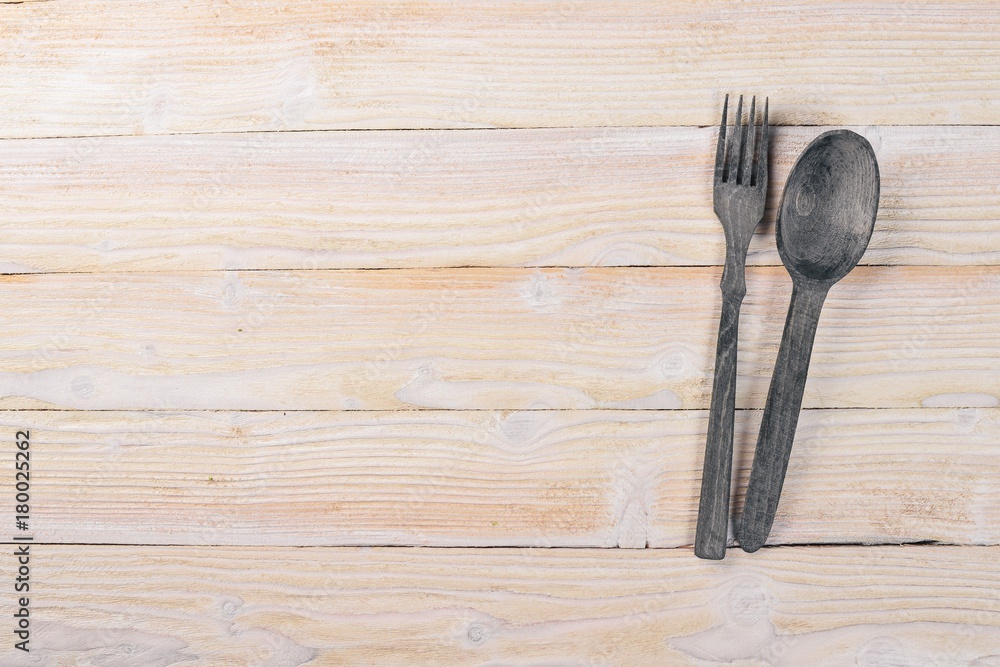 Old cutlery. On a wooden background. Top view. Free space for text. Old cutlery. On a wooden background. Top view. Free space for text.
