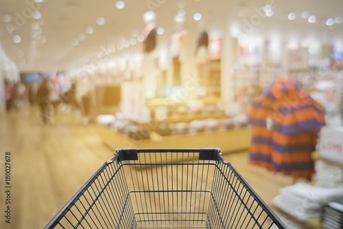 Abstract blurred photo of store with trolley in department store bokeh background Shopping cart in supermarket and Home Hardware and furniture Stores