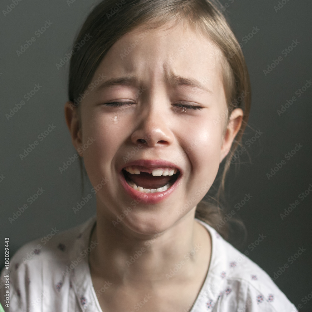 Little baby girl crying for real. Human emotions. Child psychology Little baby girl crying for real. Human emotions. Child psychology