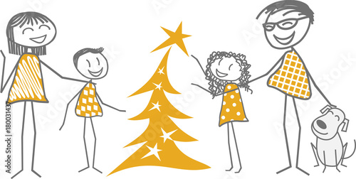 Un enfant décore le sapin de Noël aidé de sa famille et d'amis