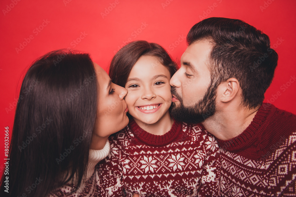Holly molly x mas time! Close up of three charming beautiful relatives, married couple of brunet and brunette haired, excited girl with mom and dad, in knitted cute traditional x mas costumes Holly molly x mas time! Close up of three charming beautiful relatives, married couple of brunet and brunette haired, excited girl with mom and dad, in knitted cute traditional x mas costumes