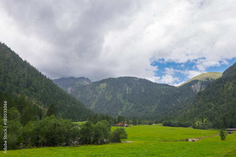 Hiking on a clouded day at Lake Achen (Achensee), Achen Valley,  Karwendel and Brandenberg Alps, Tyrol, Austria, Europe