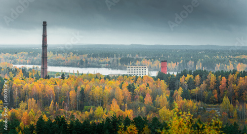 Picturesque view on valley of a national park. Trees changing colors in foothills.  Colorful Autumn day at Ogres Zilie kalni. photo