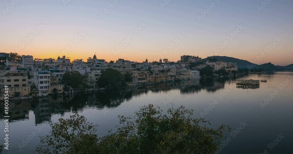 Udaipur Rajasthan India. Time lapse at sunrise from above. Travel destination and tourism landmarks. Udaipur Rajasthan India. Time lapse at sunrise from above. Travel destination and tourism landmarks.