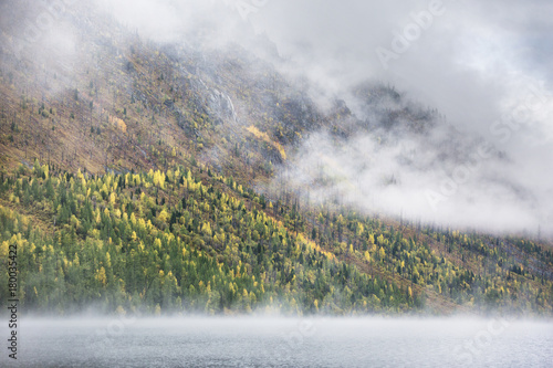 Foggy morning. Lower Multinskoe Lake. Mountain Altai autumn landscape photo