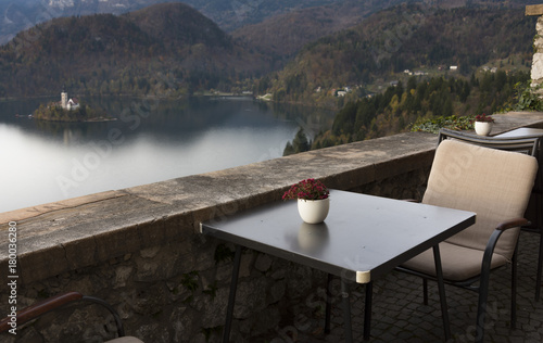 Table and two chairs with a upper view of the lake photo