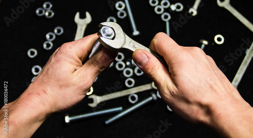 Turn the hand nut on the bolt  