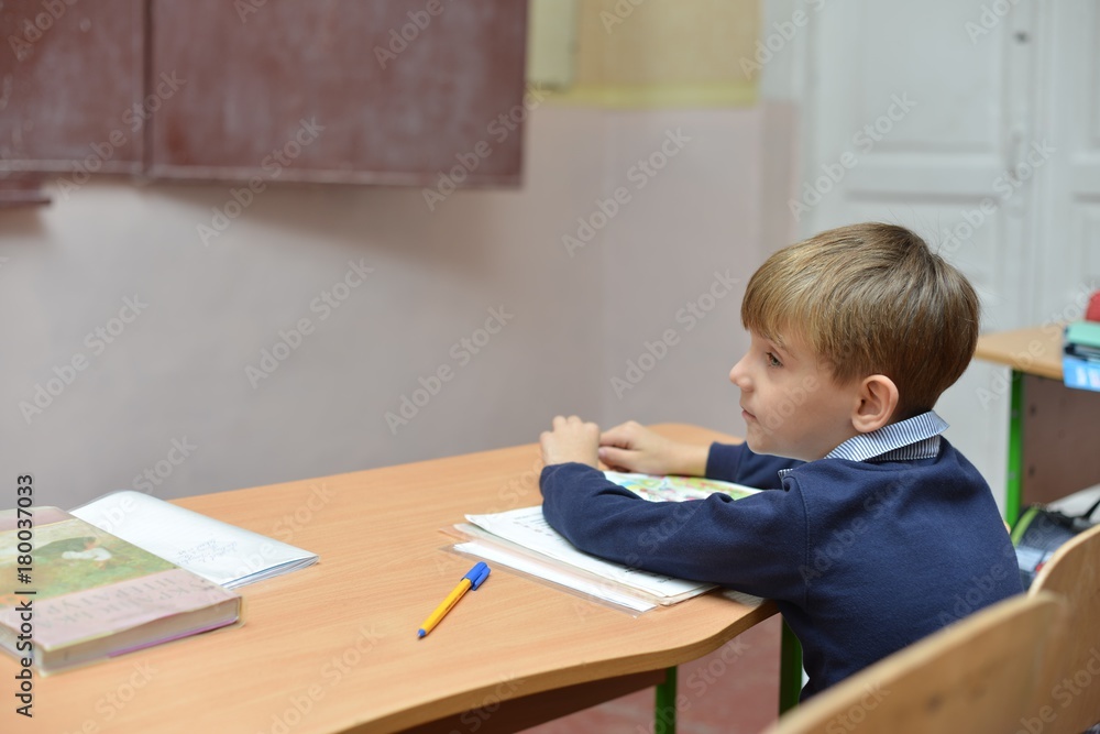 the boy at the school at the blackboard the boy at the school at the blackboard