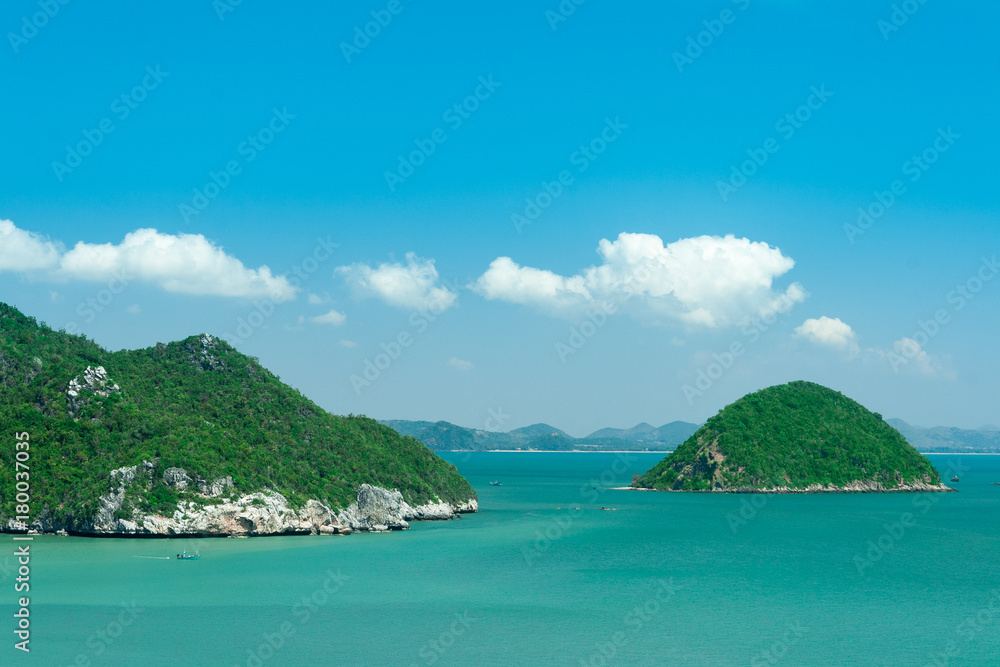 Green islands and boats on the sea, Thailand