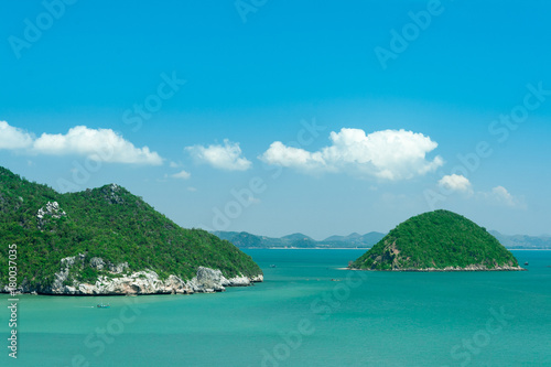 Green islands and boats on the sea, Thailand © Wasin