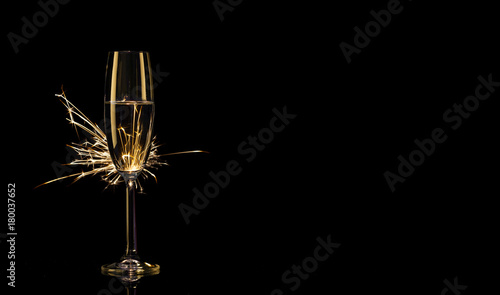 Glass of champagne in Bengal lights