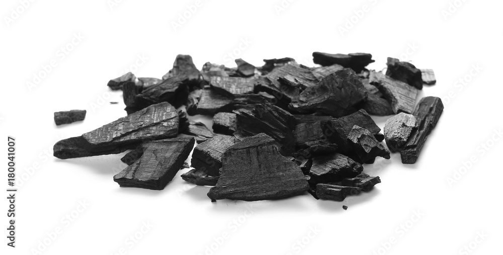 Pile black charcoal isolated on white background

