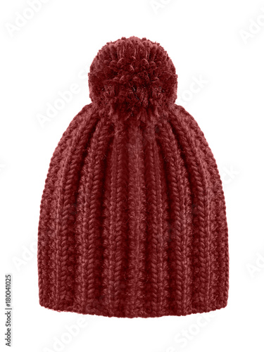 Brown woolen winter cap hat with a pom pom pompon isolated on white