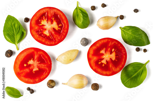 Photos tomato, garlic and basil isolated on white background