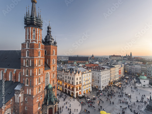 Aerial view of old city center view in Krakow at sunset time, main square, famous cathedral in evening light