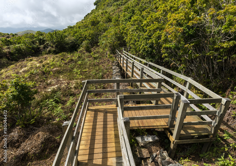 View of track with wooden fences over Fumaroles, Furnas de Enxofre, Terceira, Azores, Portugal. View of track with wooden fences over Fumaroles, Furnas de Enxofre, Terceira, Azores, Portugal.