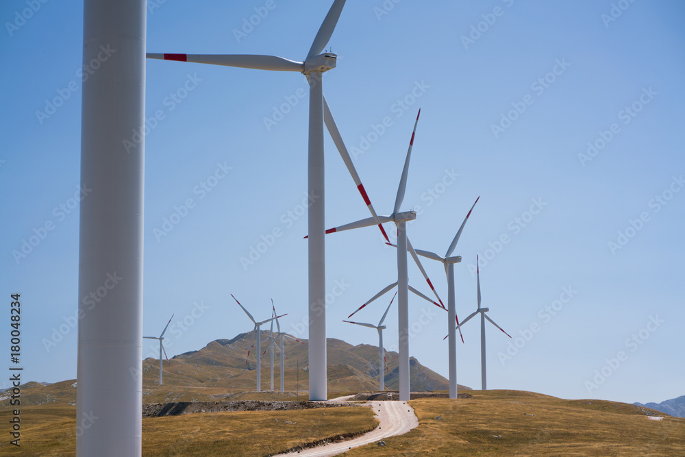 Windmills converting wind energy into electricity Windmills converting wind energy into electricity