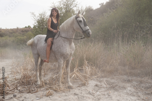 young woman on horseback