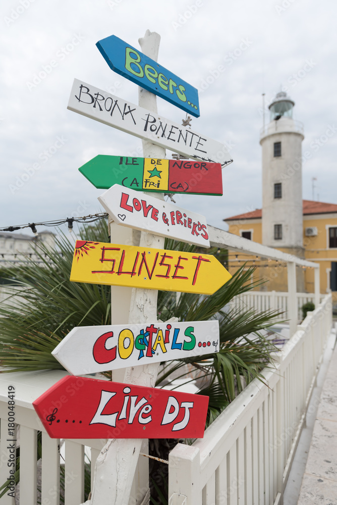 Colored signs on the beach