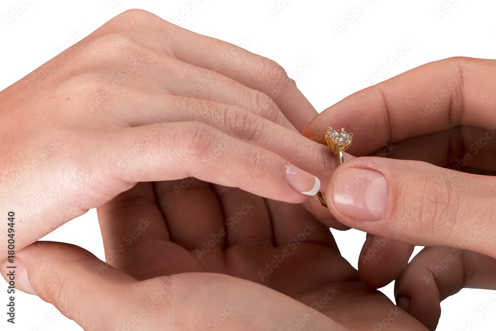 Close up Groom Putting the Wedding Ring on bride's finger Close up Groom Putting the Wedding Ring on bride's finger