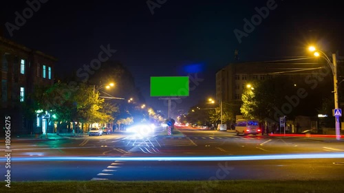 Wallpaper Mural A billboard with a green screen on a background of city traffic with long exposure. Time Lapse. Torontodigital.ca