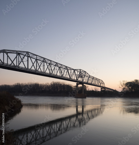 Bridge over Missouri River at Decatur, Nebraska at Sunrise in Winter