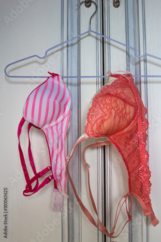 Two bras of different sizes. photo
