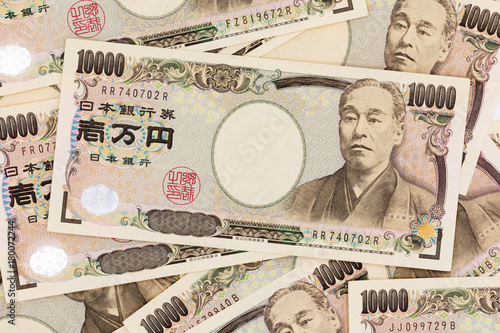 Close up of Japanese currency yen bank notes. 10,000 Japanese Yen