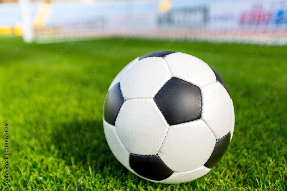 Fototapeta premium Closeup of a Soccer Ball and Goalpost