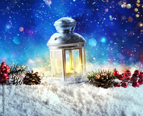 Shiny lantern on a Christmas background during the night