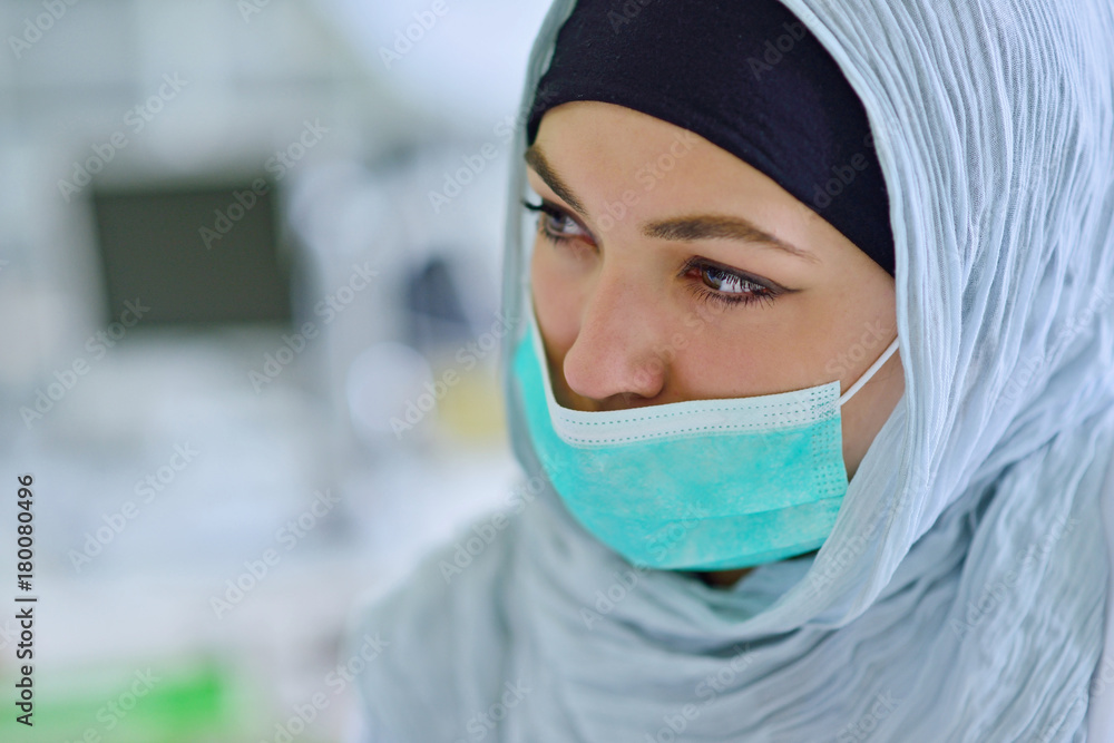 Arab students with hijab while working on the denture, false teeth. Arab students with hijab while working on the denture, false teeth.