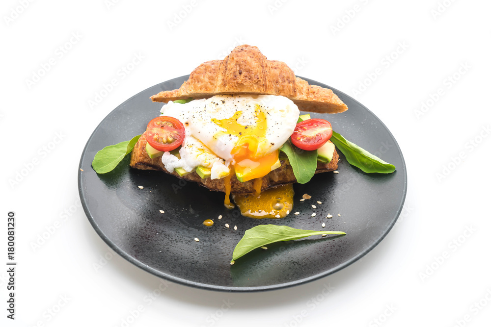 egg benedict with avocado, tomatoes and salad - healthy or vegan food style egg benedict with avocado, tomatoes and salad - healthy or vegan food style