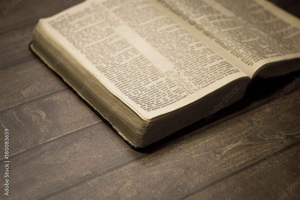 Fototapeta premium Bible with wooden background 
