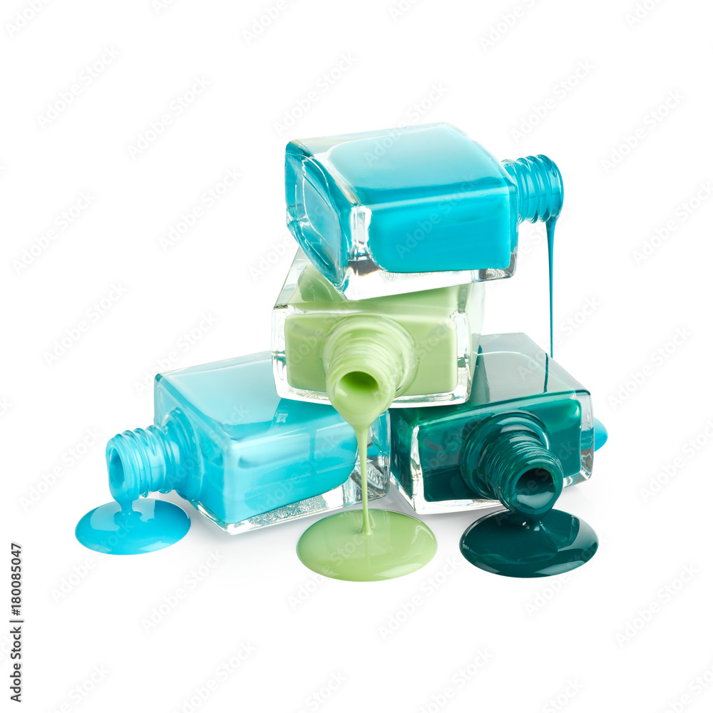 Stack of bottles with spilled nail polish isolated on white background Stack of bottles with spilled nail polish isolated on white background