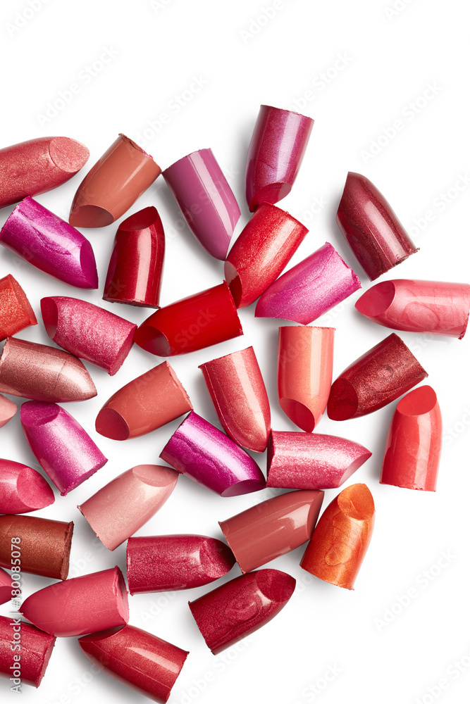 Colored lipsticks isolated on white background Colored lipsticks isolated on white background