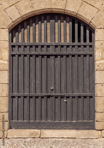 Old black medieval antique castle door in front texture © bennian_1