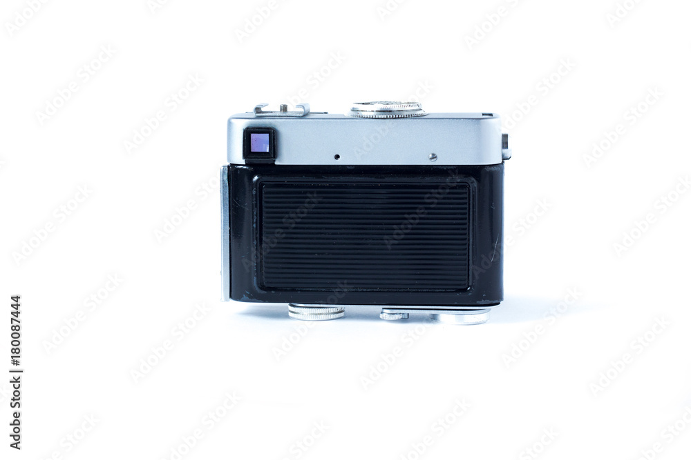 Old film camera back side. White background close-up. Vintage photo . Old film camera back side. White background close-up. Vintage photo .