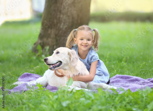 Cute little girl with dog i...