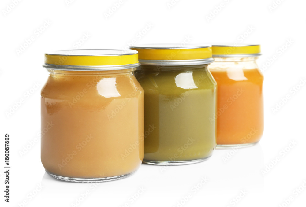 Jars with different baby food on white background Jars with different baby food on white background