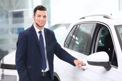 Car salesman in dealership