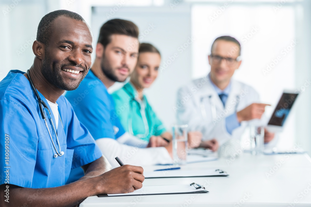 team of doctors having conversation team of doctors having conversation