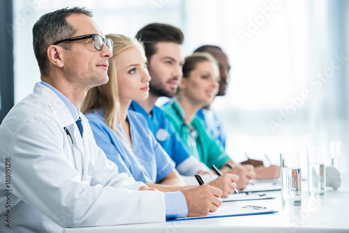 doctors sitting at table