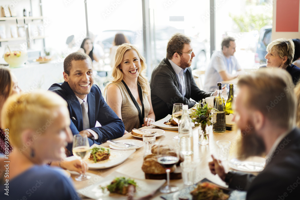 Group of diverse people are having lunch together Group of diverse people are having lunch together