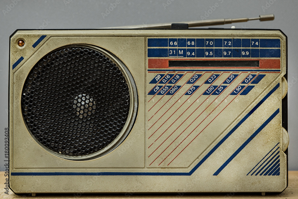 Vintage radio on wall background