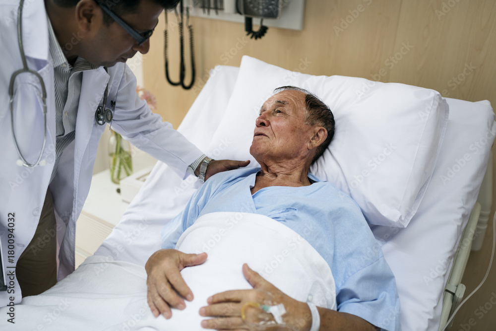 A sick elderly is staying at the hospital A sick elderly is staying at the hospital