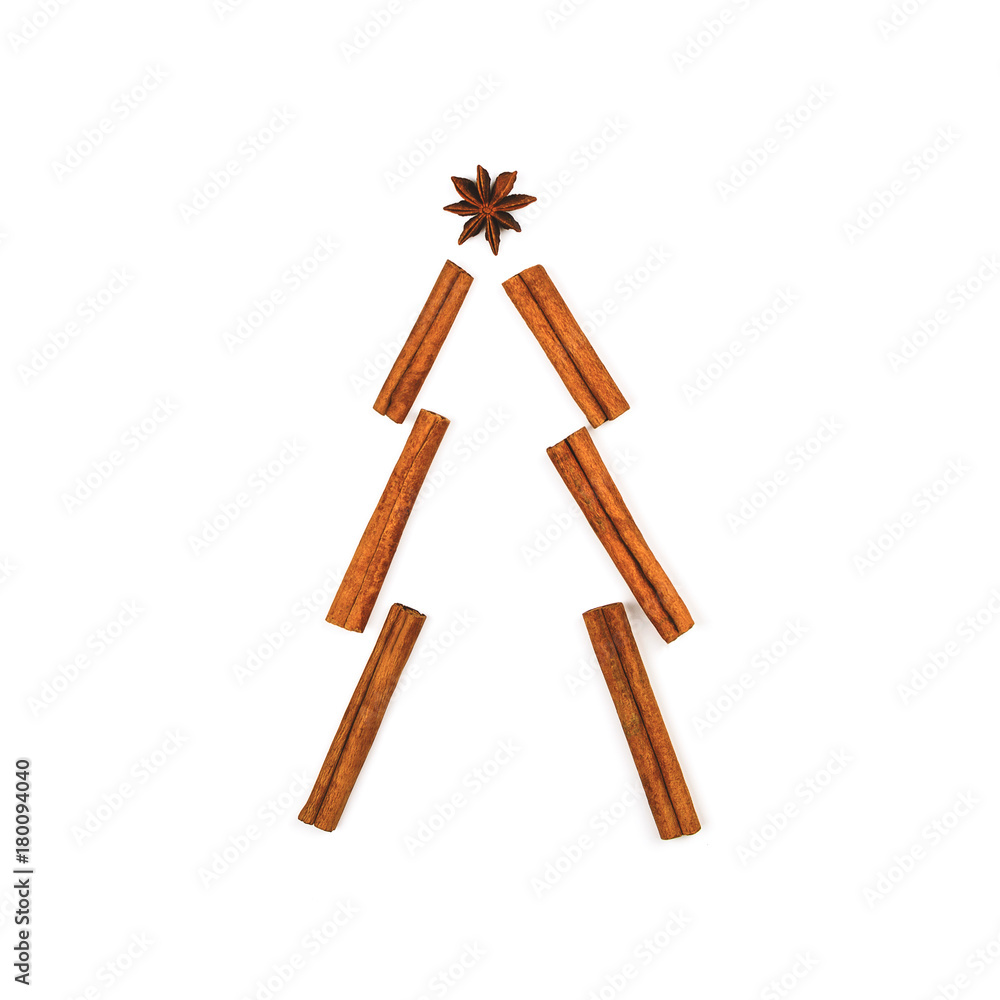 Christmas tree made of spices: cinnamon sticks and anise star. Square Christmas tree made of spices: cinnamon sticks and anise star. Square