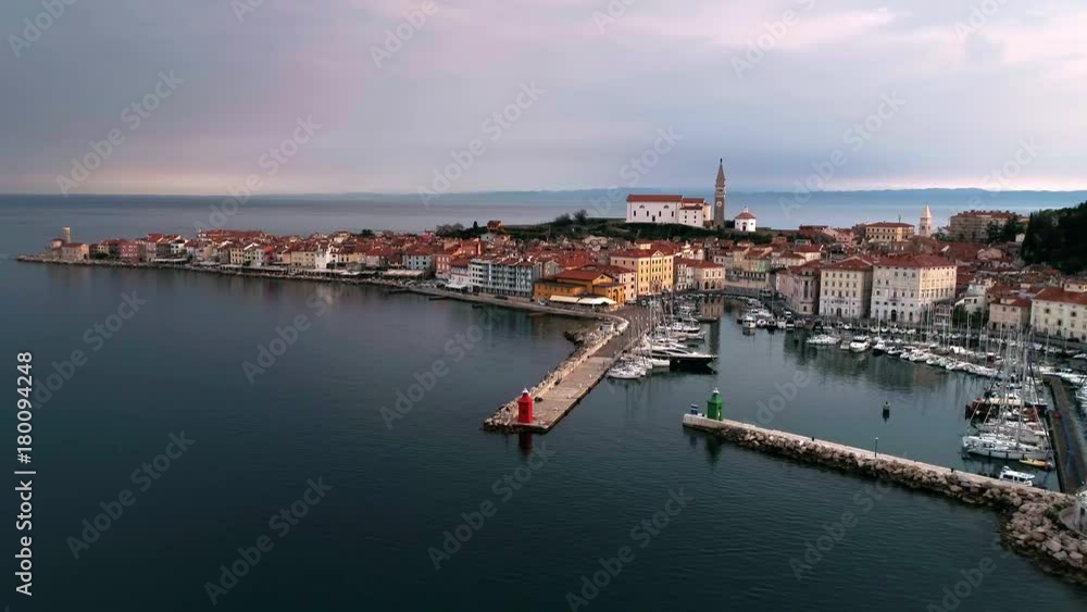 Aerial view over looking the town of Piran Slovenia as dark clouds build up on the horizon. Aerial view over looking the town of Piran Slovenia as dark clouds build up on the horizon.