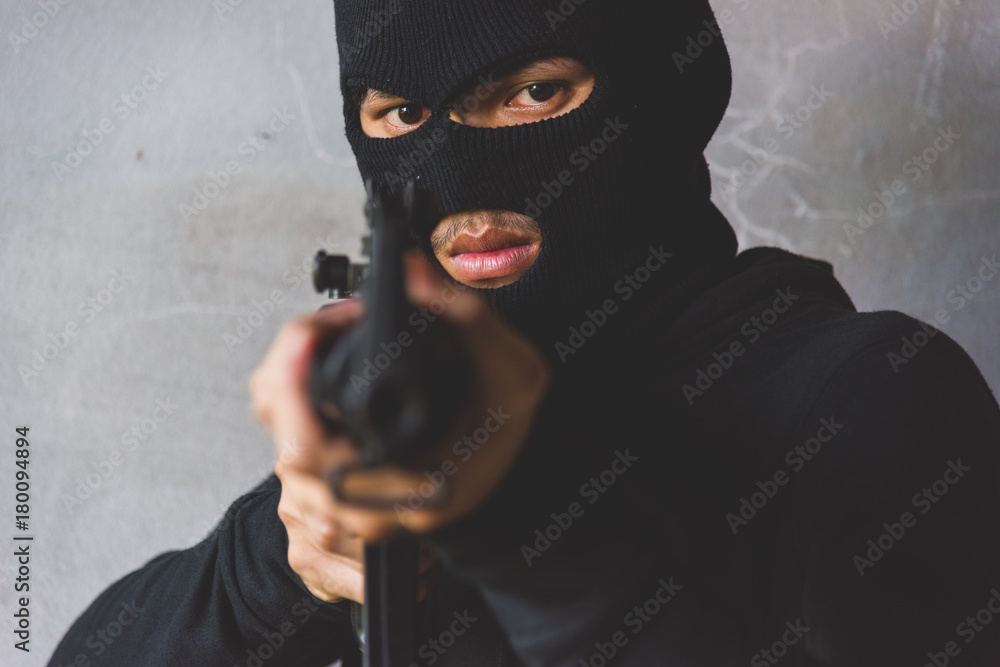 Gunman killer was aiming his gun focus at face Gunman killer was aiming his gun focus at face